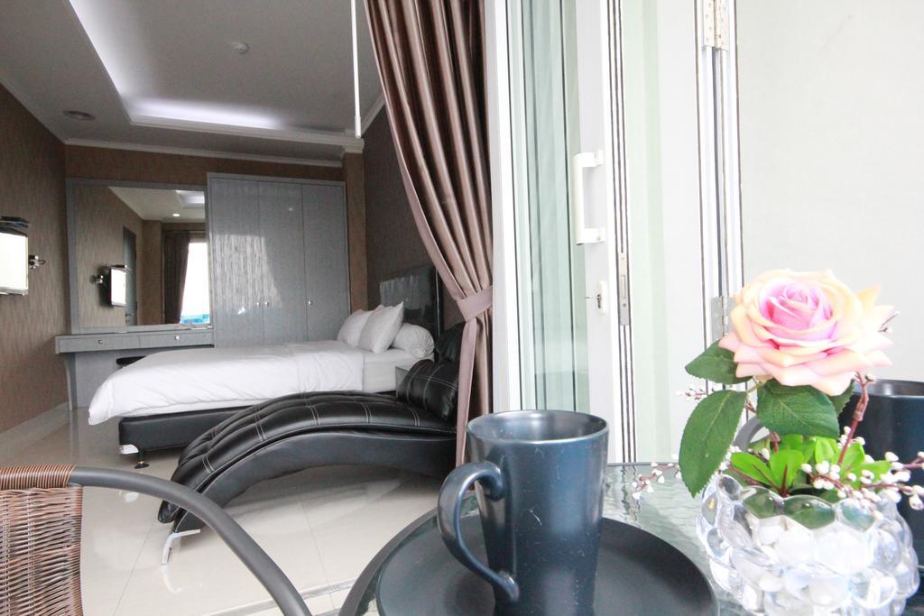 Harvia Suites Kebon Jeruk Джакарта Экстерьер фото