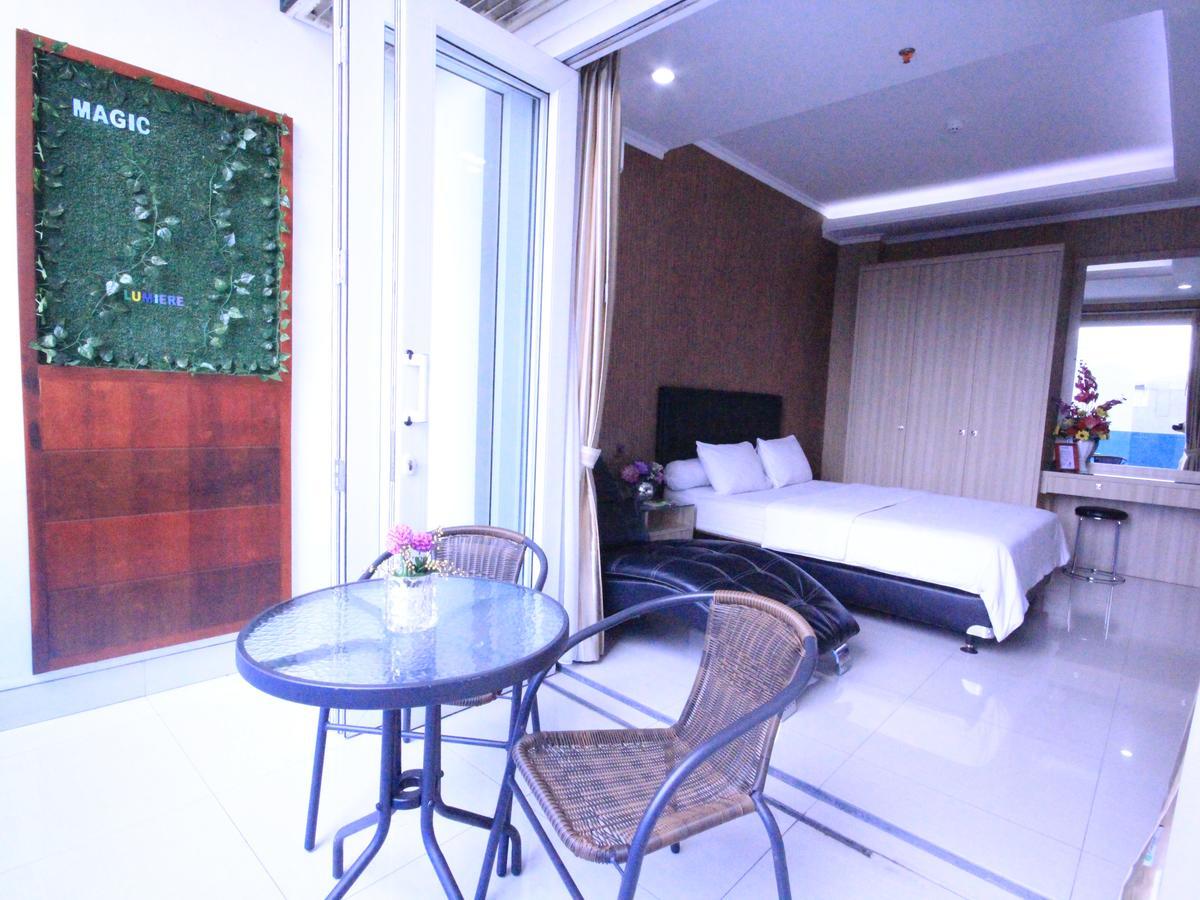 Harvia Suites Kebon Jeruk Джакарта Экстерьер фото