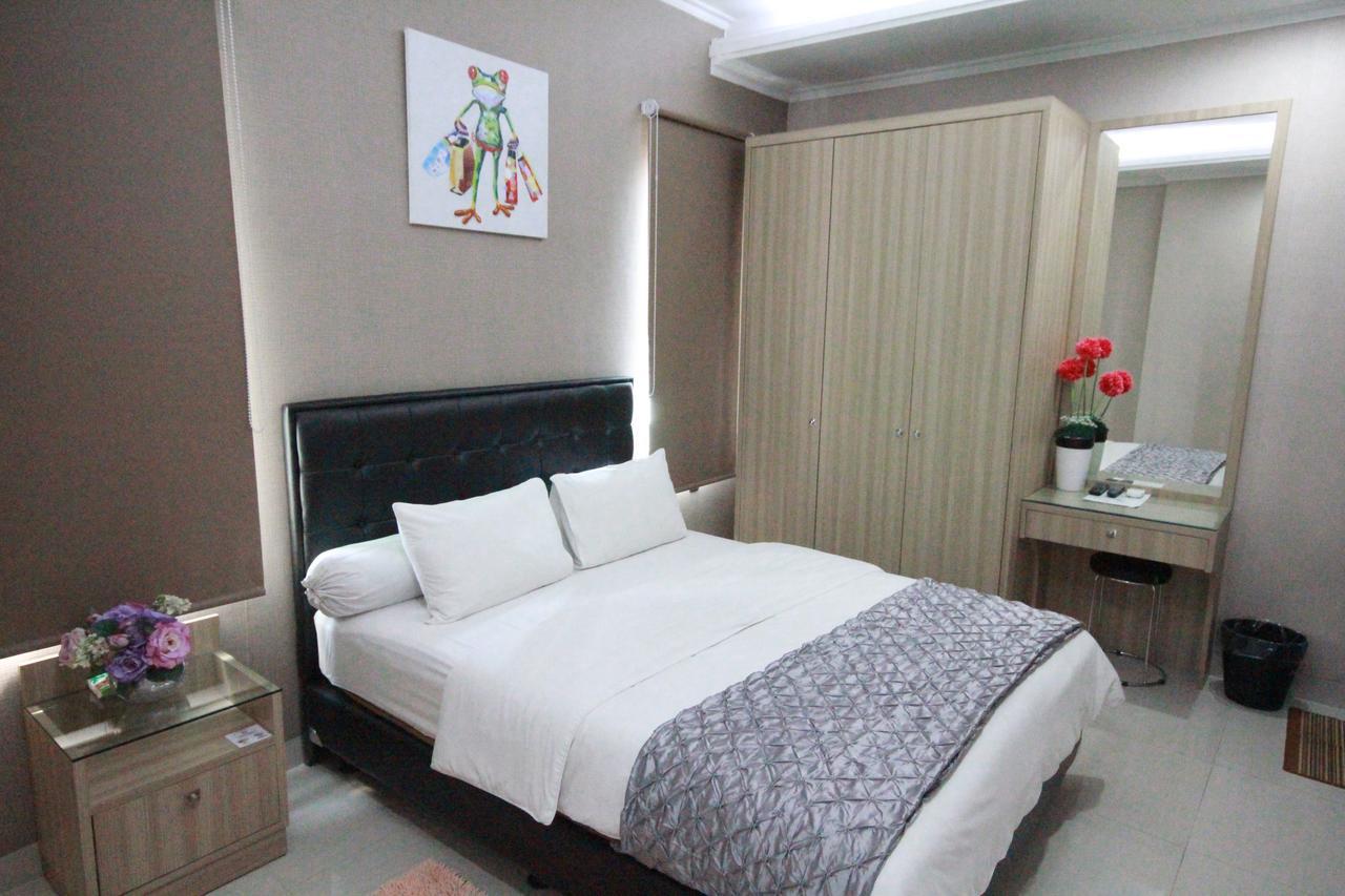 Harvia Suites Kebon Jeruk Джакарта Экстерьер фото
