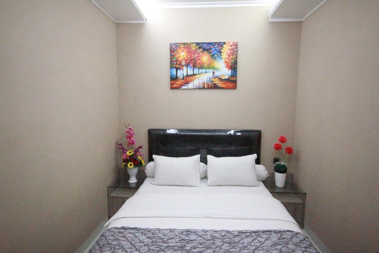 Harvia Suites Kebon Jeruk Джакарта Экстерьер фото